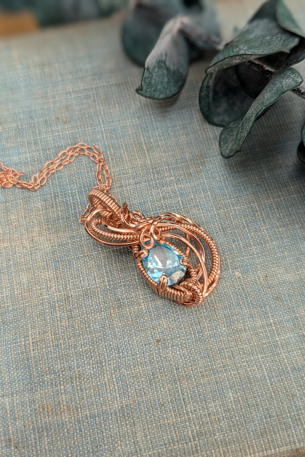 Rose Gold Filled Wire Wrap Necklace with Light Blue Cubic Zirconia Stone